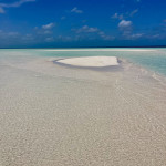 nur noch wenig Sandbank guckt aus dem Wasser...